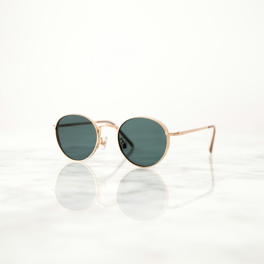 Sunglasses on a white surface