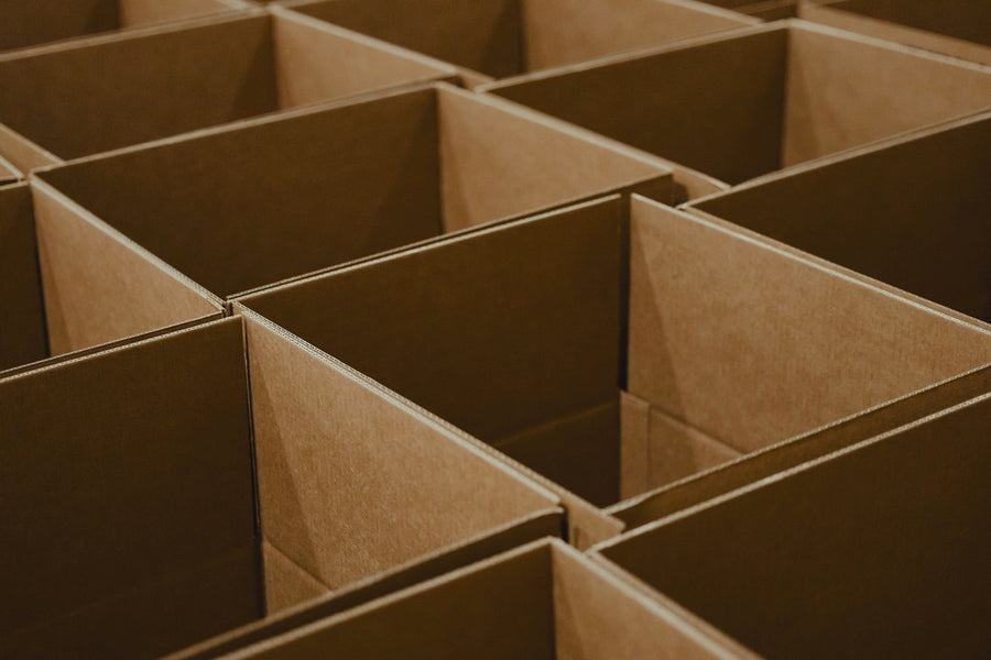 Open cardboard boxes ready to ship